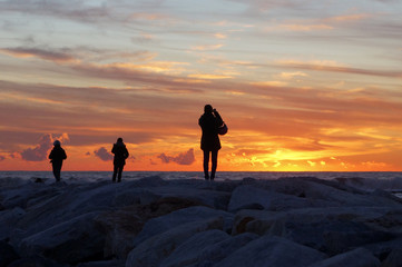 Fototapeta na wymiar people in the sunset