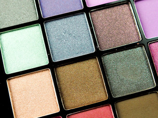 palette cosmetic eye shadow many colors, space, beauty and fashion.
