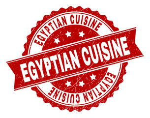 EGYPTIAN CUISINE seal print with corroded surface. Rubber seal imitation has circle medal form and contains ribbon. Red vector rubber print of EGYPTIAN CUISINE title with corroded texture.
