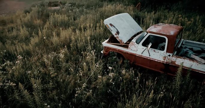 Grassy Feild old broken pick up truck 4k slowmo