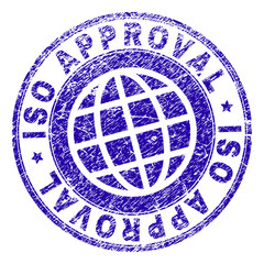 ISO APPROVAL stamp imprint with grunge texture. Blue vector rubber seal imprint of ISO APPROVAL tag with grunge texture. Seal has words arranged by circle and planet symbol.