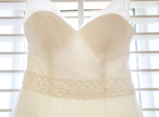 White Elegant Wedding Dress Details of Jewels and Fine Fabric