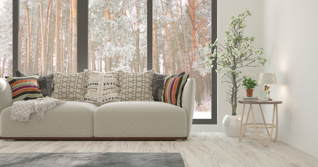 White room with sofa and winter landscape in window. Scandinavian interior design. 3D illustration