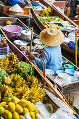 Traditional floating market in Damnoen Saduak