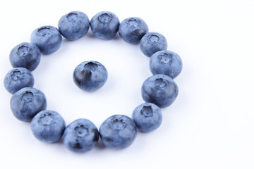 Blueberries on white background, blueberry berries isolated, blue berries close-up, blank for designer, vegetarian food