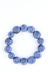 Blueberries on white background, blueberry berries isolated, blue berries close-up, blank for designer, vegetarian food
