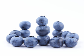 Blueberries on white background, blueberry berries isolated, blue berries close-up, blank for designer, vegetarian food