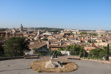 Fototapeta na wymiar Above the rooftops of Rome, Italy