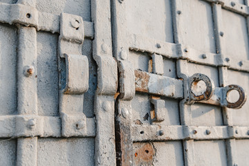 Metal bolt on the antique door