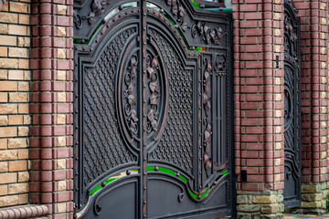 ornate wrought-iron elements of metal gate decoration