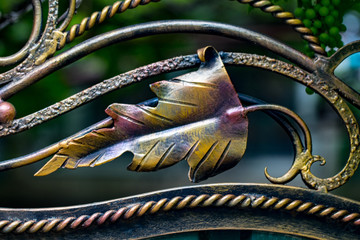 ornate wrought-iron elements of metal gate decoration