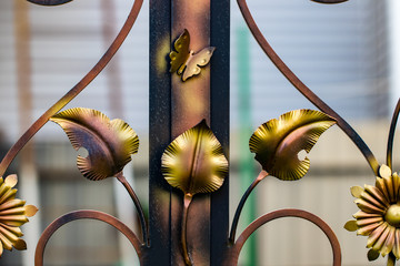 ornate wrought-iron elements of metal gate decoration
