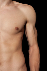 Fototapeta na wymiar giovane uomo muscoloso posa a torso nudo