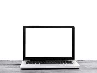 Fototapeta premium Laptop with blank screen on wooden desk isolated on white background