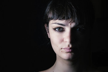 Portrait of a woman in the shadows