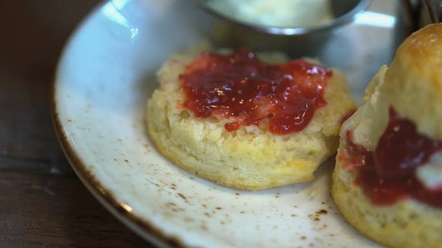 tasty scone bekery with strawberry jam and fresh cream