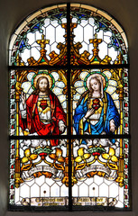 Naklejki  Najświętsze Serce Jezusa i Maryi  witraż starożytnego kościoła parafialnego w Gries, Bolzano