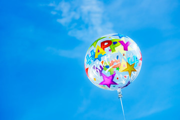 Happy Birthday Ballon on the Sky Background