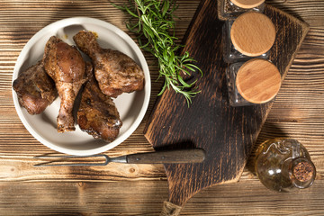 Raw marinated chicken drumsticks.