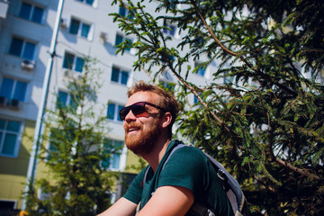 adult man in playground. man with beard and glasses. stylish modern young © Евгений Вершинин