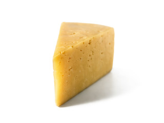 Piece of hard cheese on isolated white background