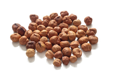 isolated handful of hazelnuts