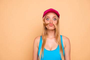 Portrait of young attractive nice cute straight-haired blonde funky girl wearing casual, bright...