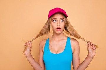 Portrait of young attractive nice cute straight-haired blonde funky girl wearing casual, bright...