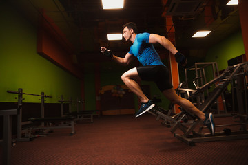 Obraz na płótnie Canvas The man in the gym.Guy's training.The Sports Guy.Man's health