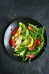 Vegetable salad with roasted chicken breast.Top view with copy space.