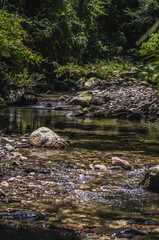 Valley, water and stones scenery  