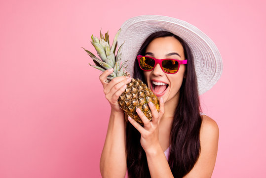 Good mood lifestyle leisure people person concept. Close up studio photo portrait of cool with toothy beaming smile lady holding ananas in hands isolated pastel bright background