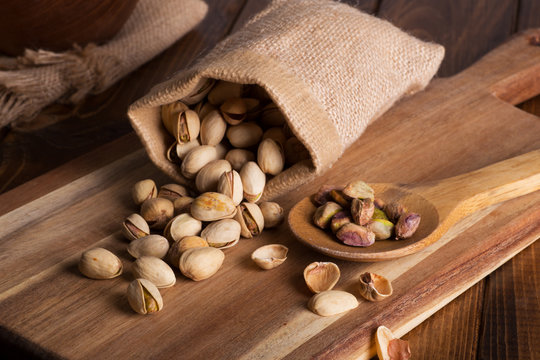 Pistachio Nuts Spilled From A Burlap Bag