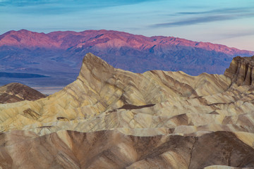 Alpine Glow on Distant Mountain Range As The Sun Rises, Zabriskie Point, Death Valley