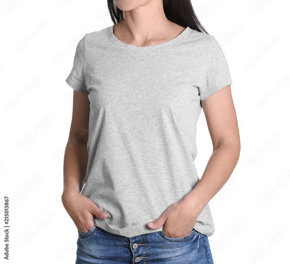 Wall mural Young woman in grey t-shirt on white background. Mockup for design