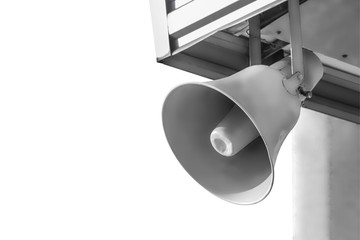 Megaphone on building against white background