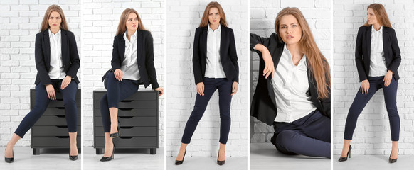 Set with young woman in stylish suit on brick wall background