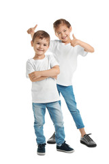 Little kids in t-shirts on white background. Mockup for design