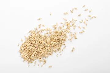 Fotobehang Raw barley on white background. Healthy grains and cereals © New Africa