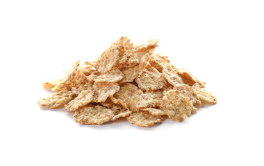 Wheat flakes on white background. Healthy grains and cereals