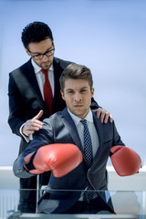 lawyer prepares a young businessman to the defense