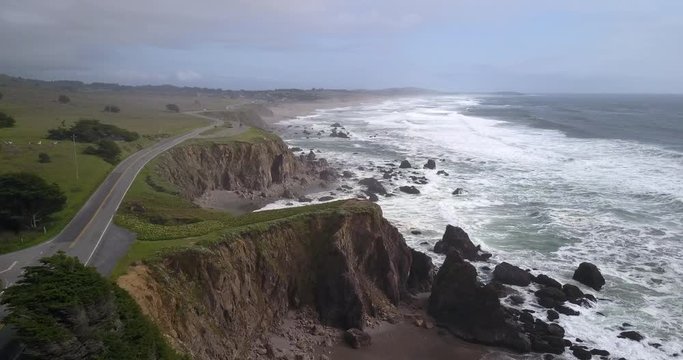 Aerial drone view of the coast line along the Pacific Coast Highway in Bodega Bay, California.