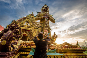 Fototapeta na wymiar Hua Hin - Pranburi: June 15, 2018, tourists visit the beautiful church at Wat Summanawat (Wat Khao Ka Lok), Tambon Pak Nam Pran, Amphoe Sam Roi Yot, Chang Wat Prachuap Khiri Khan, Thailand