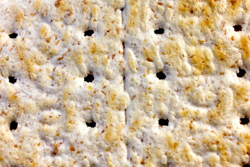 close-up of whole salted cracker surface