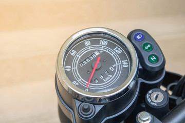 Screen display speed gauges of motorcycle miles.