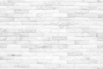 Grey and white brick wall texture background. Brickwork or stonework flooring interior rock old...