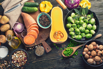 Fresh ingredients for healthy cooking  on rustic wooden background
