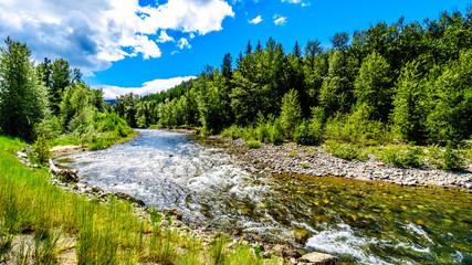 The fast flowing water of the Coldwater River near the intersection between the Coldwater Road and the Coquihalla Highway between Hope and Merritt in British Columbia, Canada