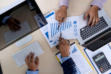 Obraz na płótnie Canvas teamwork reports accounting concept analyzing financial
