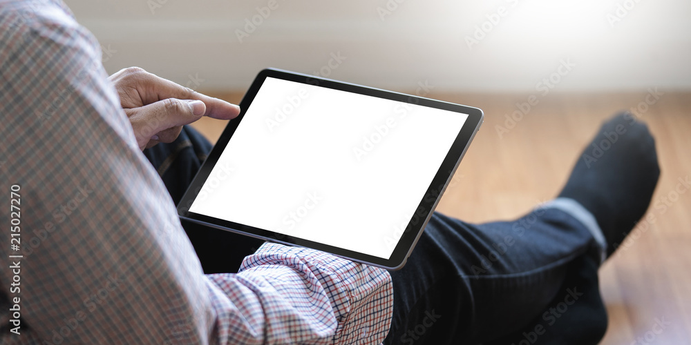 Poster digital tablet computer close up man using tablet hands man multitasking with isolated screen